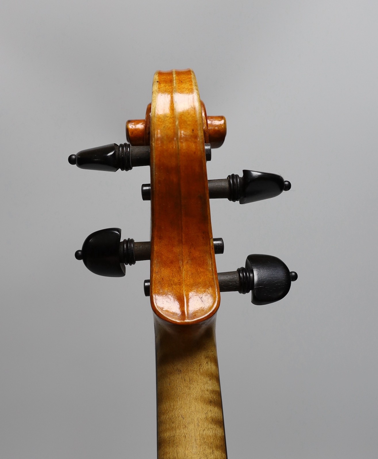 A cased violin, sound post loose